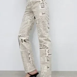 zara newspaper print pants
